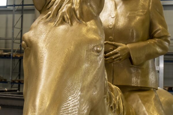 detail of 3d printed equestrian statue of angela merkel